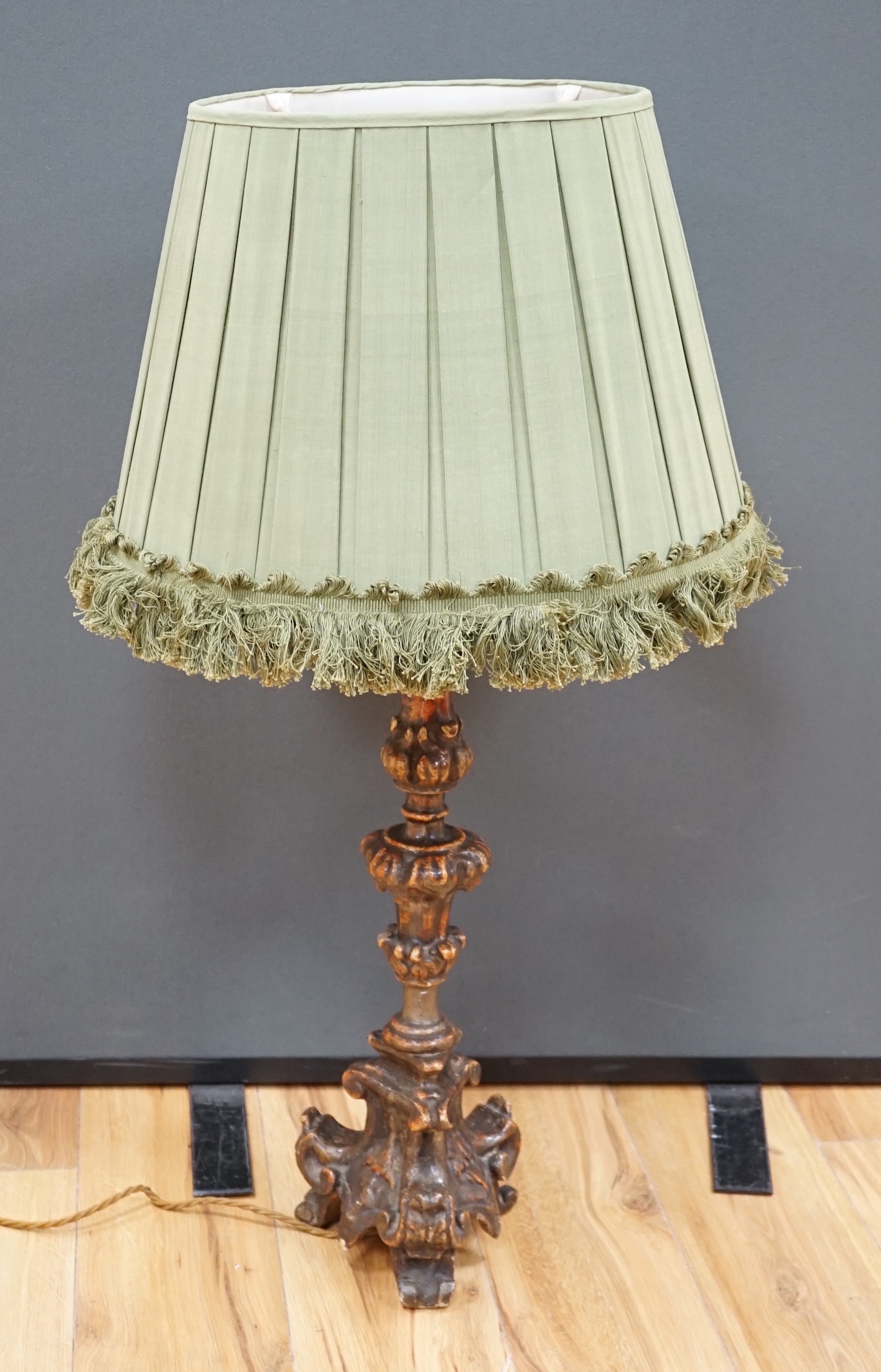 An Italian column lamp with green fabric shade, 88cm high including the shade